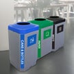 Station includes two recycling bins and one trash bin 